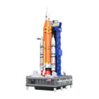 Side view of the CaDA SLS Artemis C56049W showing the blue launch tower and grey support base