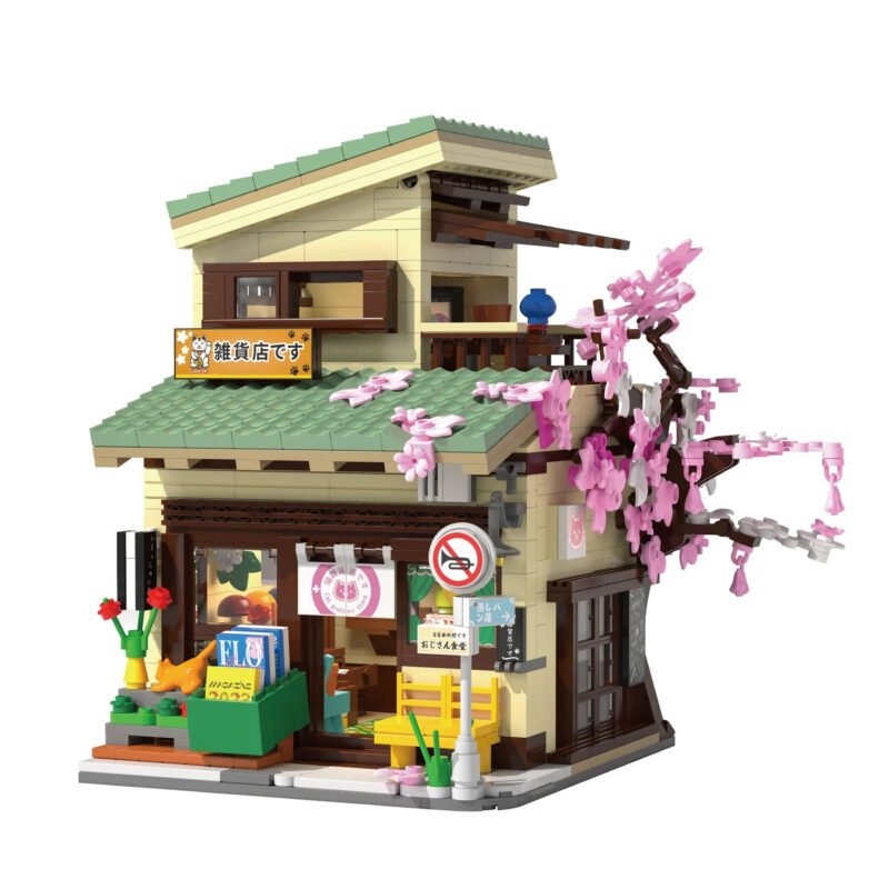 CaDA Kitty’s Japanese Grocery Store with green roofs, a pink blossom tree and a detailed shopfront.